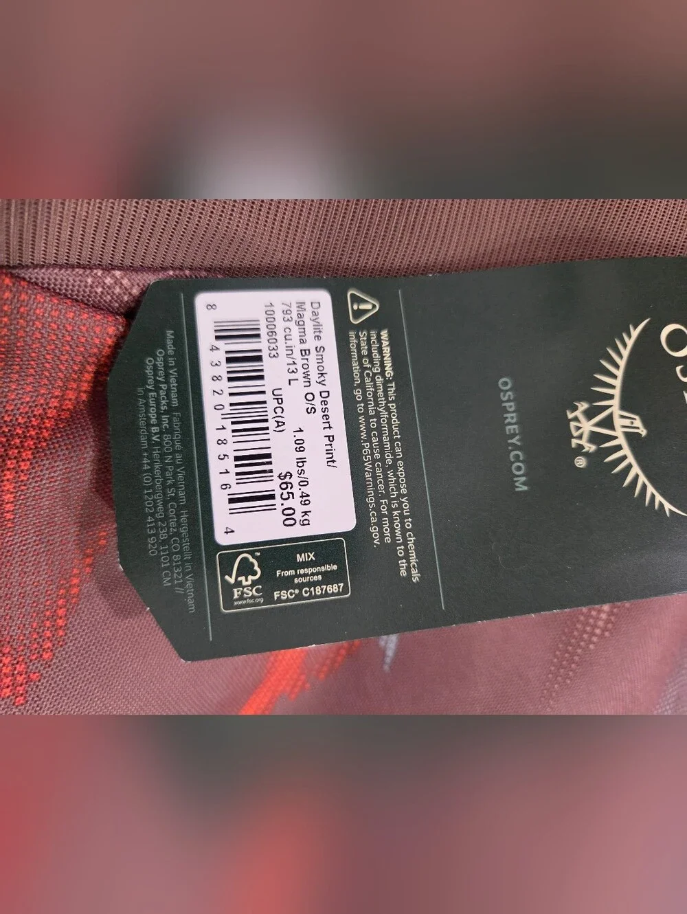 OSPREY Daylite Backpack in Dusty Rose with Blue and Orange Accents